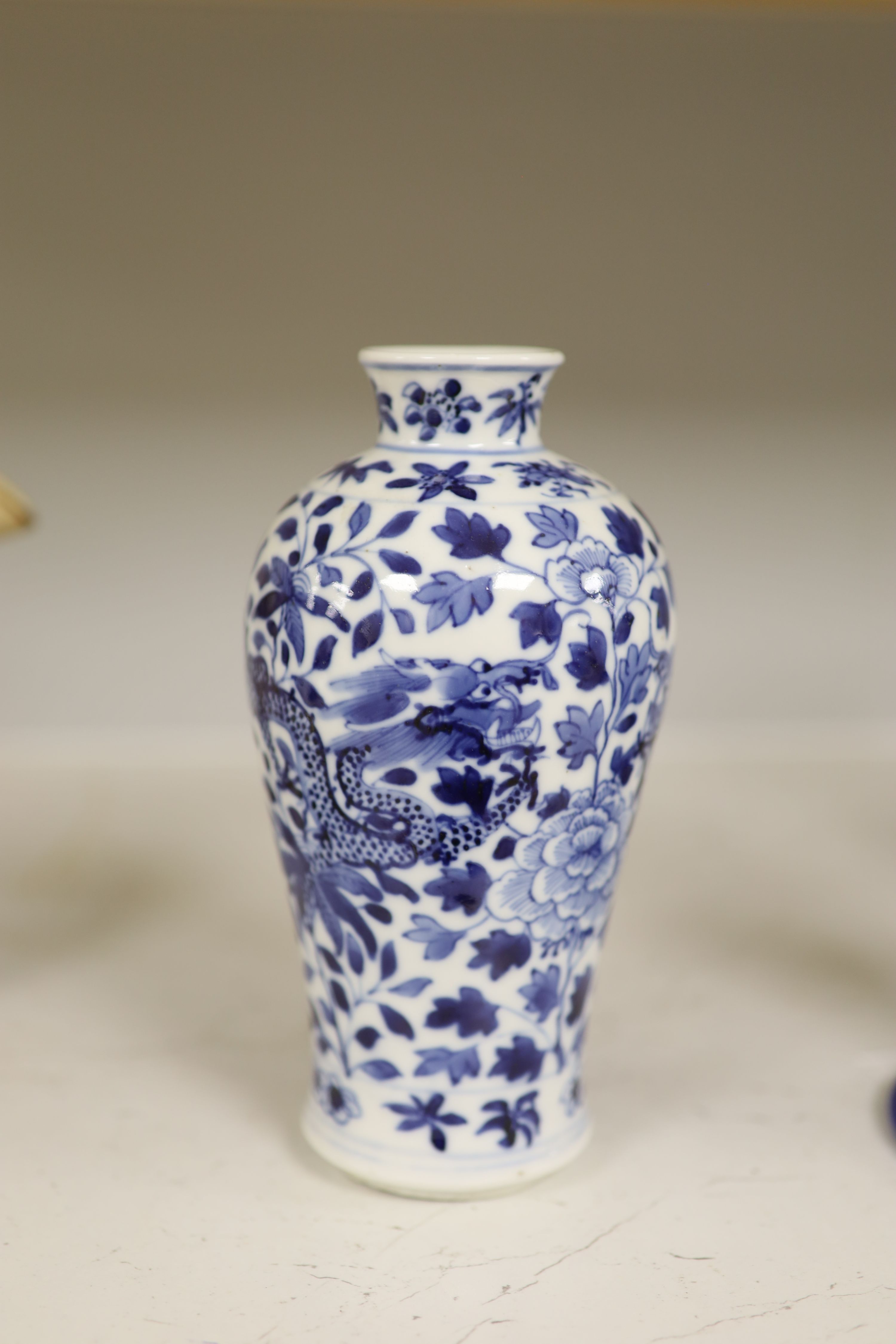 A late 19th century Chinese blue and white dragon vase, height 18cm